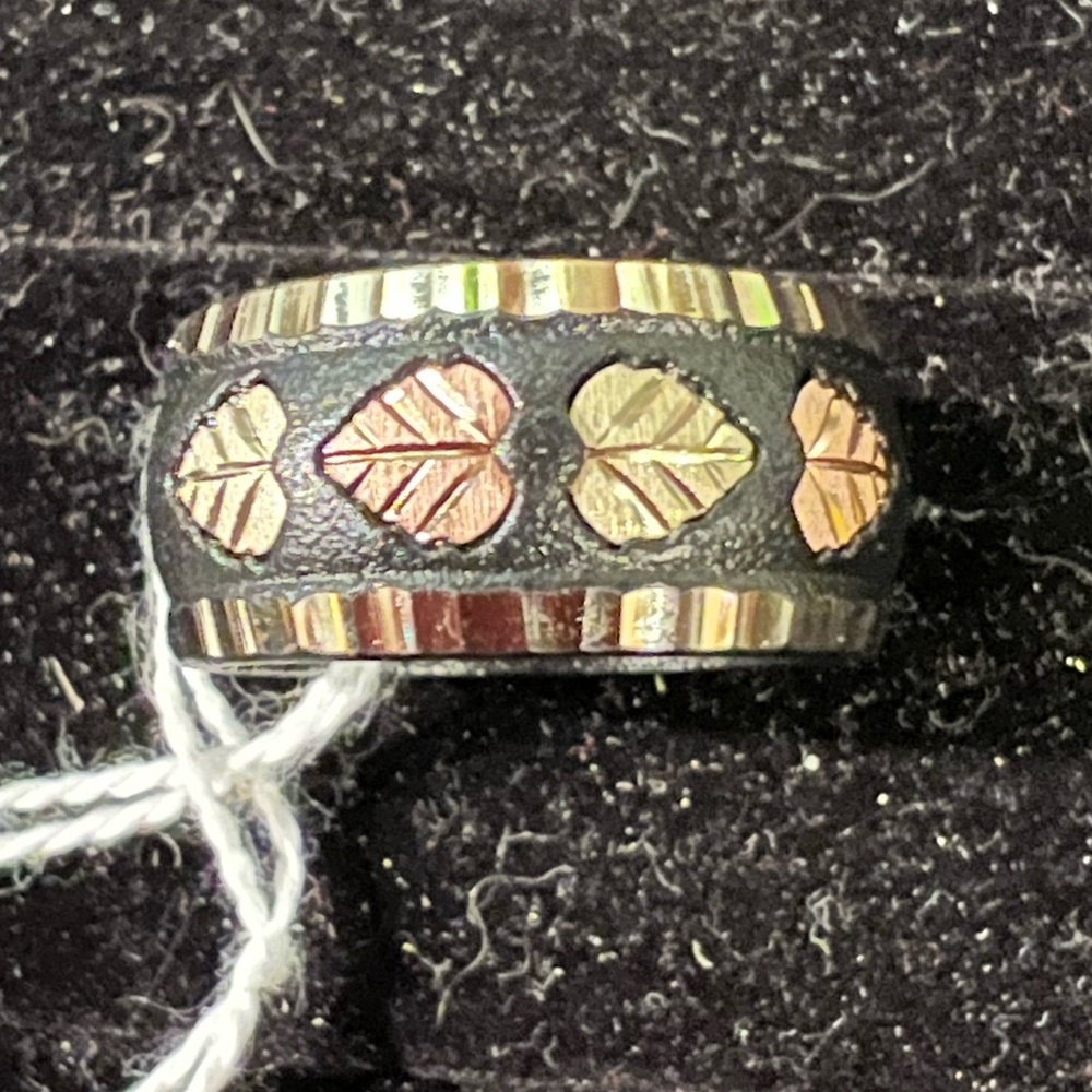 Elegant black hills gold Band Ring in a size 7 we think